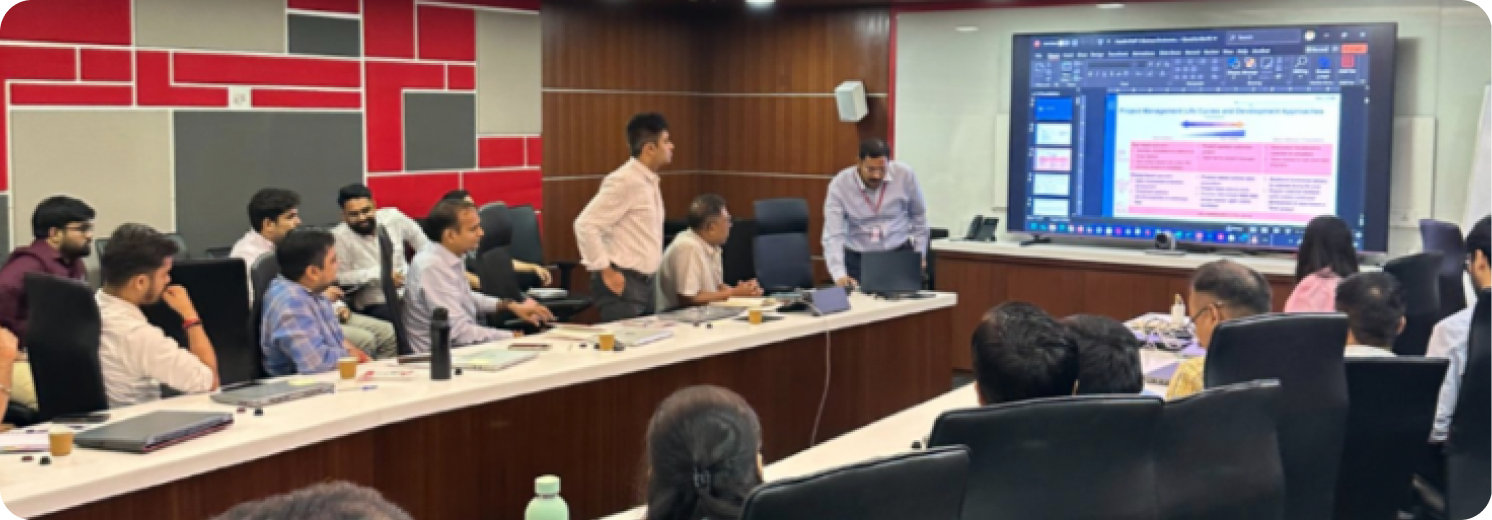 Engineers learning PCB design fundamentals during a hands-on session